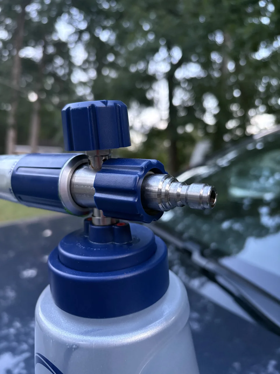 Close-up of the MJJC foam cannon connector and adjustment knob